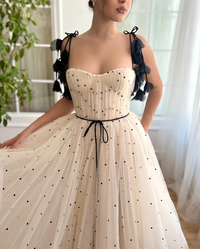 Mini dresses with bow accents for a sweet look Charmy Polka Dot Dress