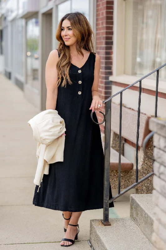 Midi dresses with mesh inserts for a trendy and breathable option Button Accented Cutout Back Midi Dress