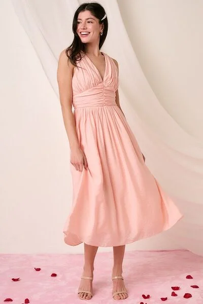 Midi dresses with ruffled bodices for a more pronounced feminine look Ruched V-Neck Sleeveless Midi Dress Midi dresses with ruffled bodices for a more pronounced feminine look Ruched V-Neck Sleeveless Midi Dress