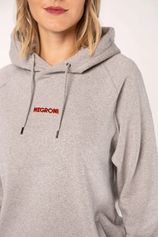 Women's tie - dye hoodie in bright colors for a retro and eye - catching styleNegroni Signature | Bestickter Bio-Baumwoll Frauen Hoodie Women's tie - dye hoodie in bright colors for a retro and eye - catching styleNegroni Signature | Bestickter Bio-Baumwoll Frauen Hoodie