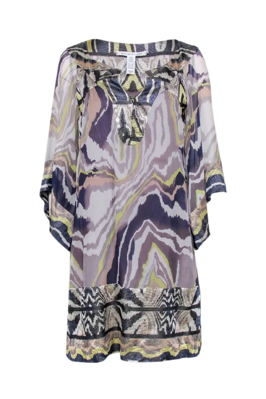 Printed Abstract Women Dress for a Modern and Artistic Appeal Printed Abstract Women Dress for a Modern and Artistic Appeal Diane von Furstenberg - Grey, Purple, Navy, & Green Print Shift Dress Sz 8