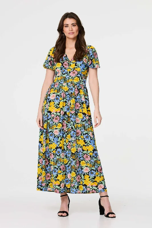 Maxi dresses with a keyhole back for a sexy detailFloral Puff Sleeve Cut Out Maxi Dress Maxi dresses with a keyhole back for a sexy detailFloral Puff Sleeve Cut Out Maxi Dress