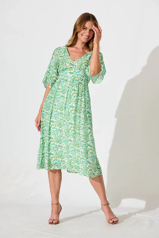 Midi dresses with bow accents for a sweet and charming lookAngie Midi Dress In Green Floral Print Midi dresses with bow accents for a sweet and charming lookAngie Midi Dress In Green Floral Print
