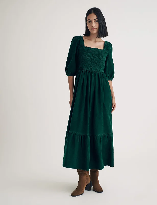 Midi dresses with ruched bodices for a feminine and fitted feelDark Green Cord Elsa Midi Dress Midi dresses with ruched bodices for a feminine and fitted feelDark Green Cord Elsa Midi Dress